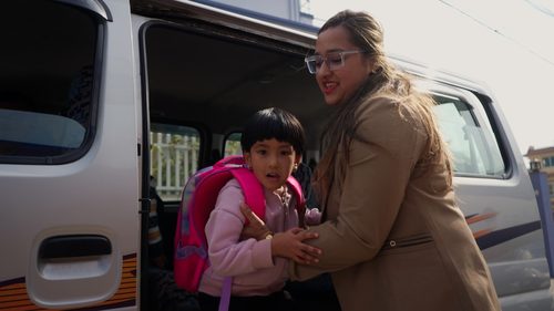 Arrival by school bus