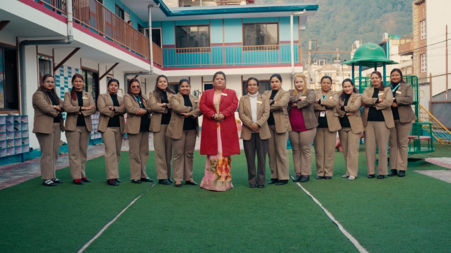 The teaching team of Kovida Pre School standing together on the school ground